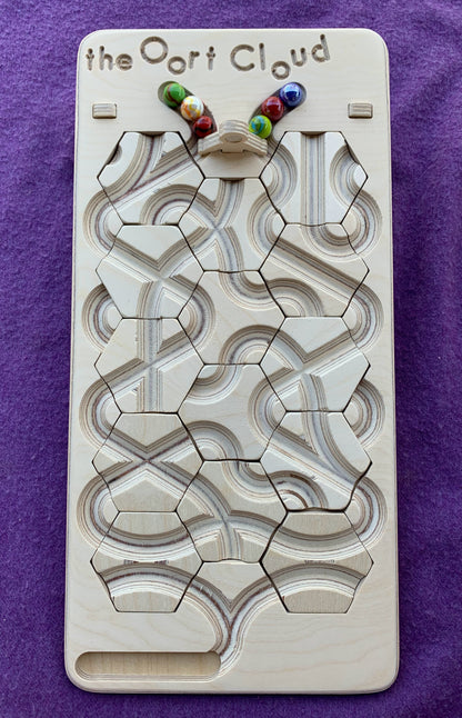 The Oort Cloud: A Marble Run Puzzle Game